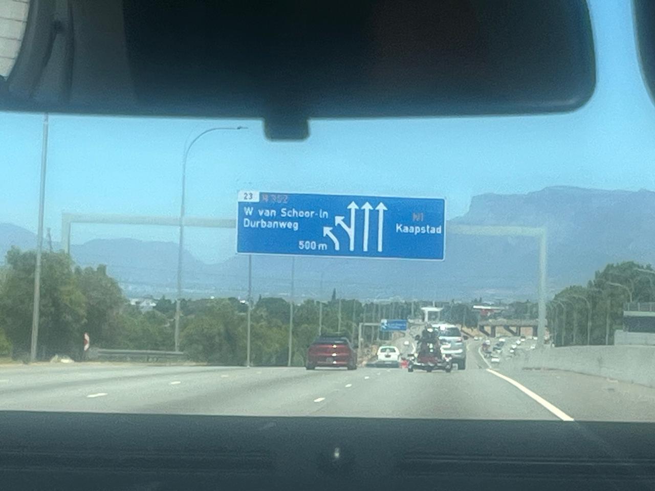 Road sign on the highway pointing the way to Kaapstad, the Afrikaans name for Cape Town